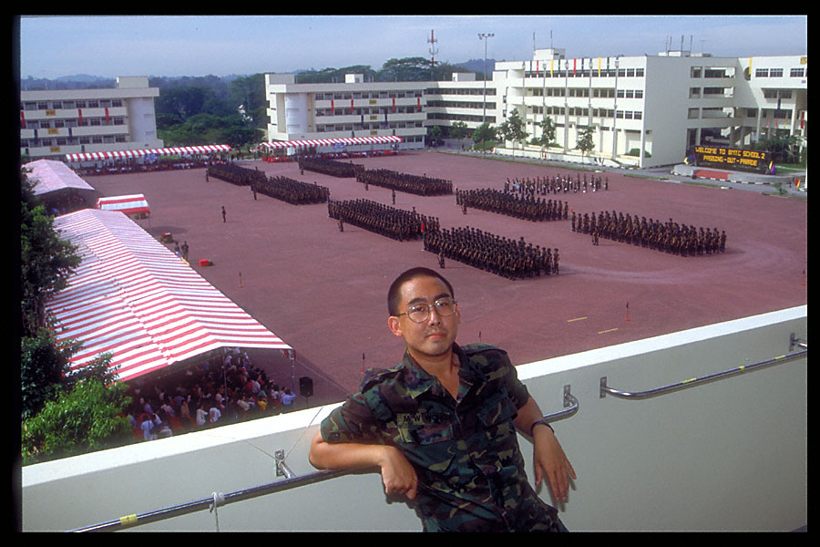 wmw on balcony with parade formation on pop day