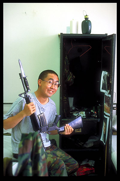 wmw with broken m16 on bed in bunk with locker