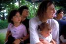 family peer out of the tour tram