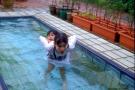 coco and kimber in the pool