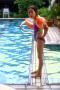 coco standing by the pool, profile