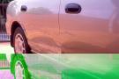 damage to mazda 323 scg5594y