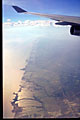 coast of thailand; rice padi fields to horizon seen from the air
