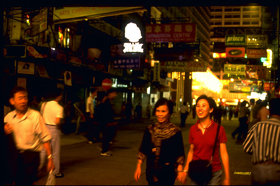 peggy lui & in-laws walking through trafficless city streets after fireworks