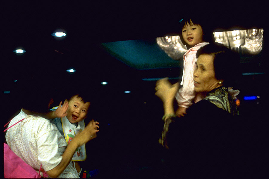 wong seng chak & wong oi yin at window with in-law