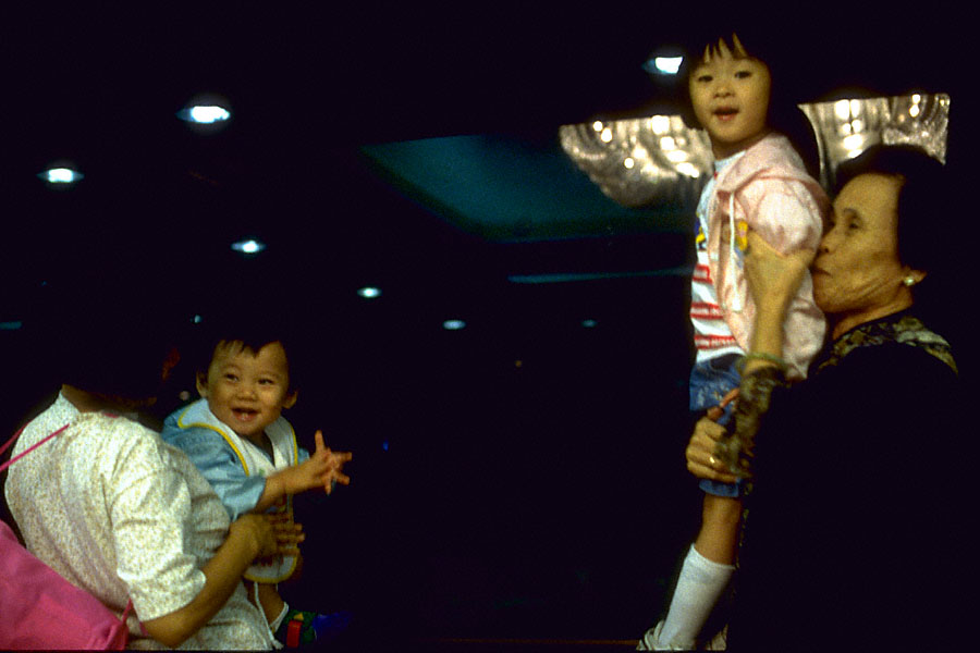 wong seng chak & wong oi yin at window with in-law