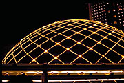 planetarium at night outlined in christmas lights