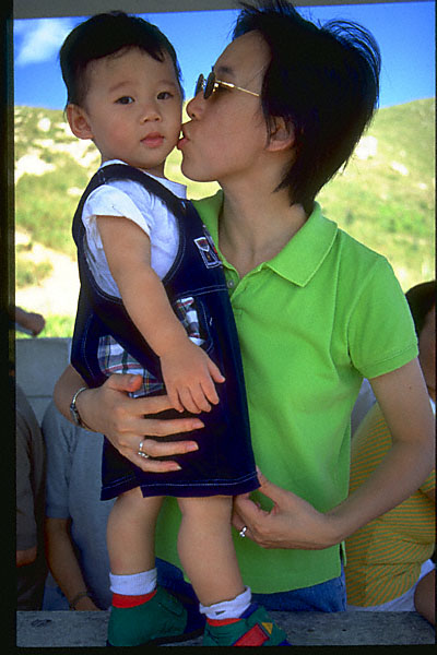 tight kiss: peggy lui kissing wong seng chak on lamma island