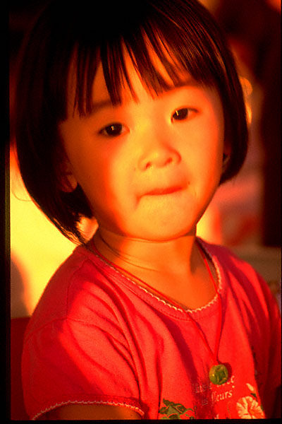 wong oi yin headshot with warm sunset light